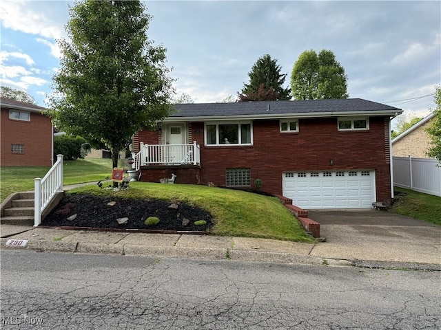 250 Crystal Ln, Weirton, WV 26062 - view of front of house featuring an attached garage, driveway, and brick siding