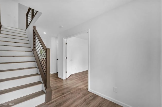 171 Henry, Bedford, OH 44146 - stairs with baseboards, wood finished floors, and recessed lighting
