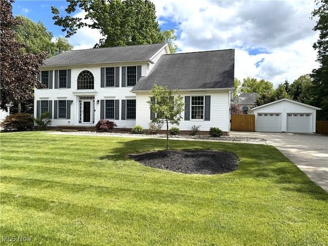2761 Timberline Dr, Cortland, OH 44410 - colonial inspired home with a garage, an outbuilding, and a shingled roof