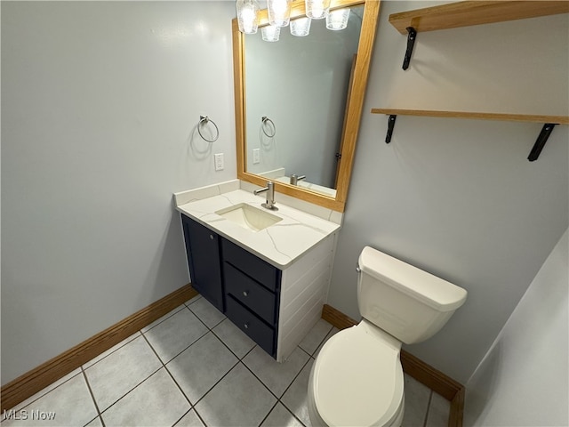 2761 Timberline Dr, Cortland, OH 44410 - bathroom featuring vanity, toilet, tile patterned floors, and baseboards