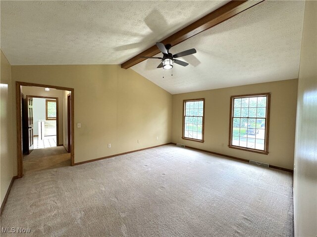 2761 Timberline Dr, Cortland, OH 44410 - empty room with ceiling fan, a textured ceiling, light colored carpet, and baseboards