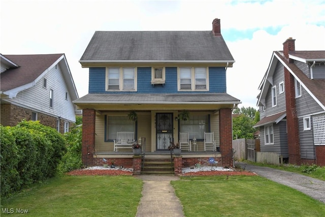 3308 Cedarbrook Rd, Cleveland Heights, OH 44118 - american foursquare style home with a porch and a chimney