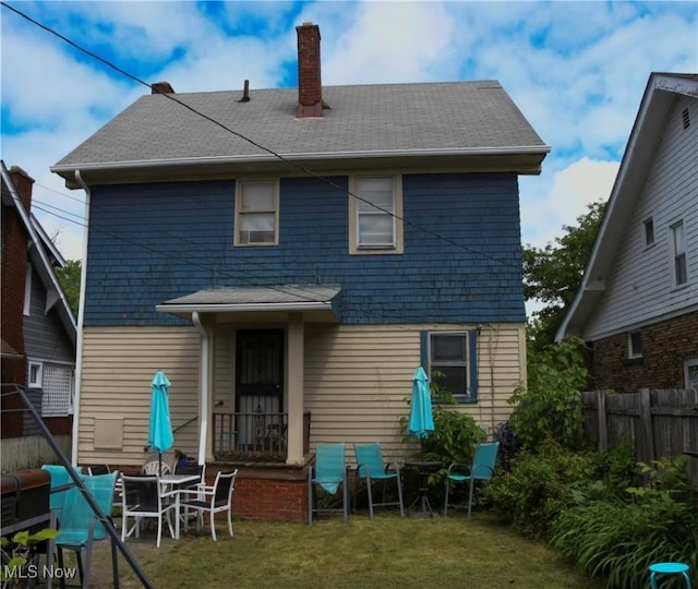 3308 Cedarbrook Rd, Cleveland Heights, OH 44118 - rear view of property featuring a chimney and roof with shingles