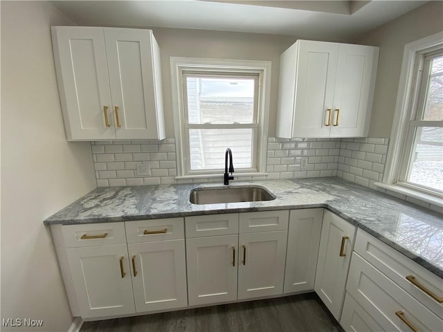 4485 Baintree Rd, University Heights, OH 44118 - kitchen featuring a sink and white cabinetry