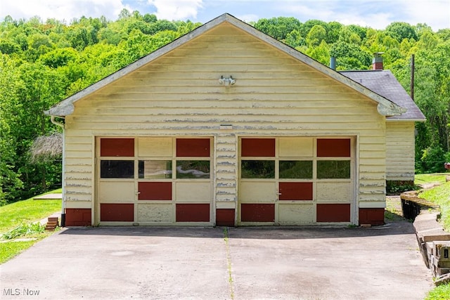 18288 Township Rd Unit 284, Coshocton, OH 43812 - detached garage featuring a view of trees