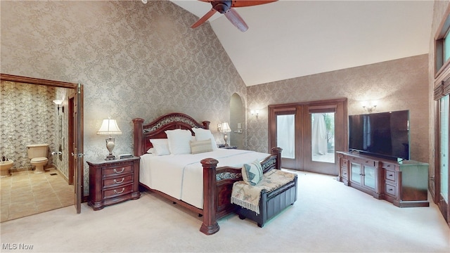 5360 Som Center Rd, Solon, OH 44139 - carpeted bedroom featuring access to outside, vaulted ceiling, arched walkways, french doors, and connected bathroom