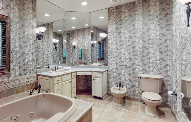 5360 Som Center Rd, Solon, OH 44139 - bathroom featuring a bidet, a whirlpool tub, vanity, toilet, and wallpapered walls