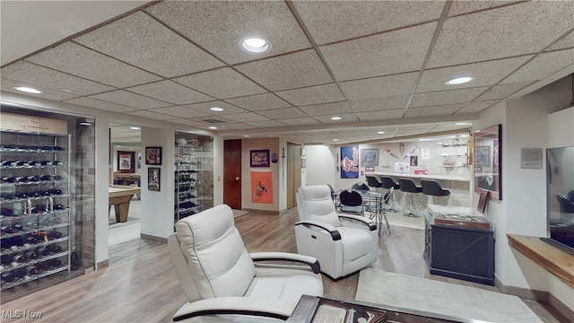 5360 Som Center Rd, Solon, OH 44139 - office featuring wood finished floors, baseboards, recessed lighting, a drop ceiling, and a bar