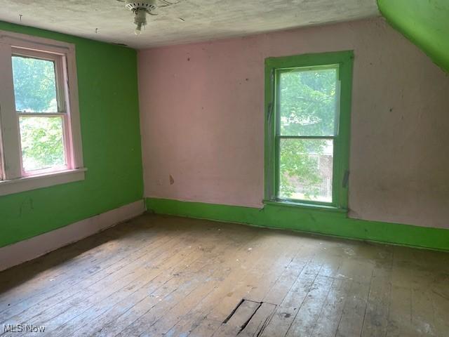 532 4th St SW, Massillon, OH 44647 - unfurnished room with hardwood / wood-style flooring and baseboards