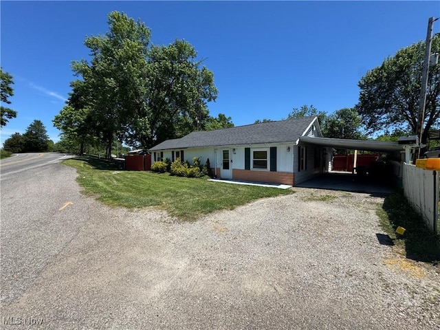 4940 State Route 26, Marietta, OH 45750 - ranch-style house featuring driveway and an attached carport