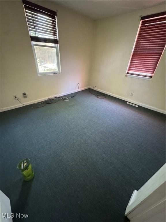 4940 State Route 26, Marietta, OH 45750 - unfurnished room with baseboards and carpet