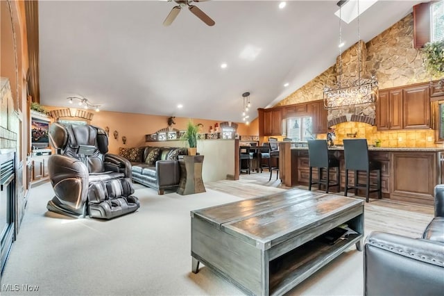 13817 Lakewood Heights Blvd, Lakewood, OH 44107 - living area featuring lofted ceiling, ceiling fan, and recessed lighting