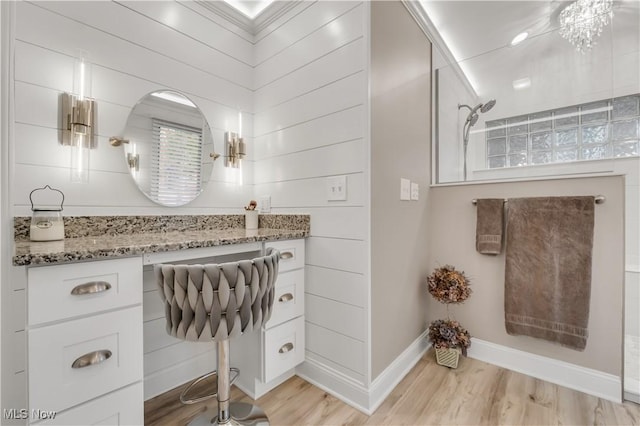 13817 Lakewood Heights Blvd, Lakewood, OH 44107 - full bath with wood finished floors, a tile shower, and baseboards