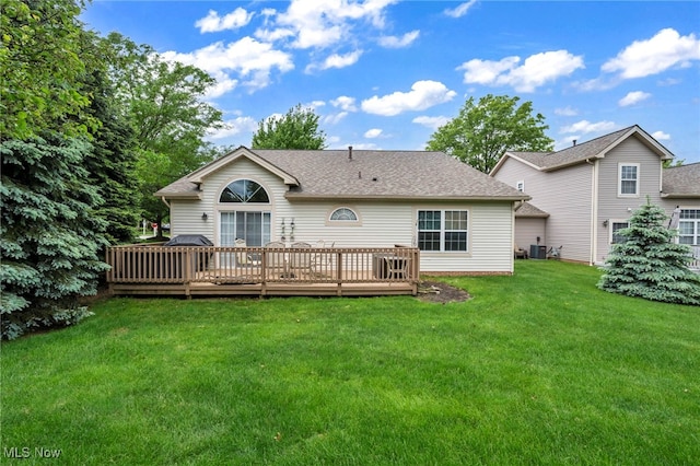 6811 Meadow Ln, Cleveland, OH 44130 - back of house featuring central air condition unit, a wooden deck, a yard, and roof with shingles