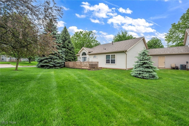 6811 Meadow Ln, Cleveland, OH 44130 - rear view of property with a lawn, a wooden deck, and central AC