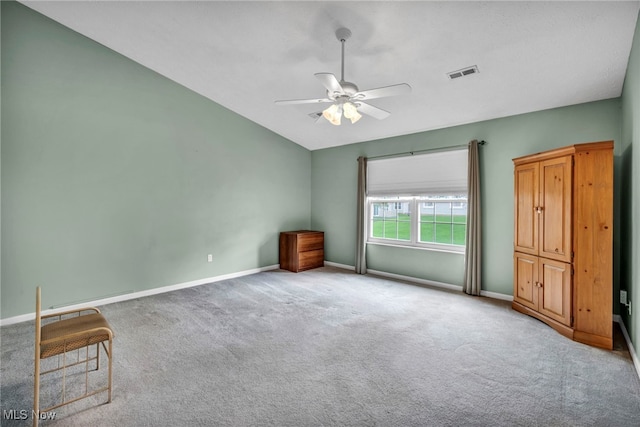 6811 Meadow Ln, Cleveland, OH 44130 - spare room featuring a ceiling fan, carpet flooring, baseboards, and vaulted ceiling