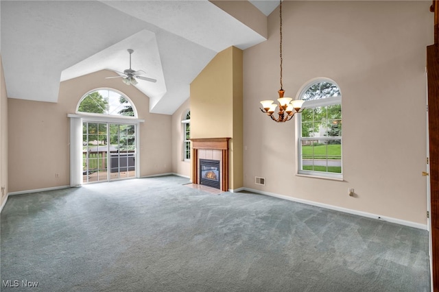 6811 Meadow Ln, Cleveland, OH 44130 - unfurnished living room featuring ceiling fan, carpet floors, baseboards, and high vaulted ceiling