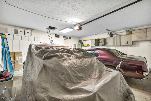 6811 Meadow Ln, Cleveland, OH 44130 - garage featuring a garage door opener