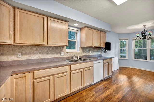 6811 Meadow Ln, Cleveland, OH 44130 - kitchen with dishwasher, light brown cabinets, and a sink