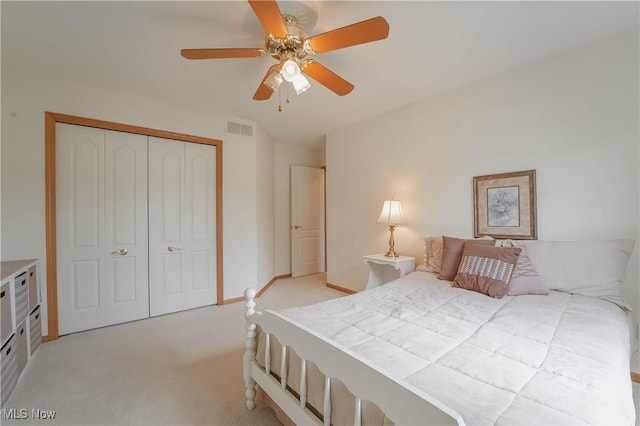 6951 Bunbury Ln, Concord, OH 44077 - bedroom featuring a closet, light carpet, a ceiling fan, and baseboards