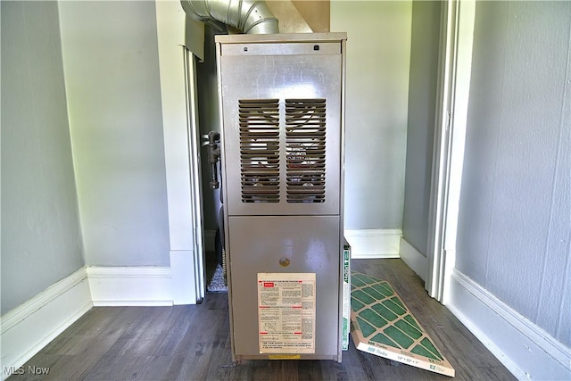 1033 Monnot Pl NW, Canton, OH 44703 - utility room with a heating unit