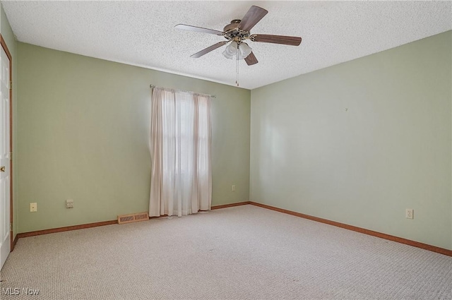 820 Southwestern Run Unit 43, Poland, OH 44514 - unfurnished room featuring a textured ceiling, light carpet, a ceiling fan, and baseboards