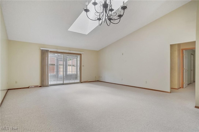 820 Southwestern Run Unit 43, Poland, OH 44514 - unfurnished room with lofted ceiling, carpet floors, baseboards, a skylight, and a chandelier