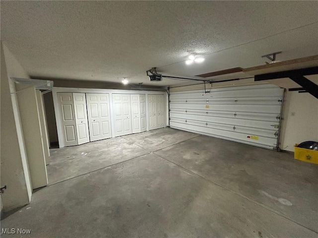 820 Southwestern Run Unit 43, Poland, OH 44514 - garage with a garage door opener