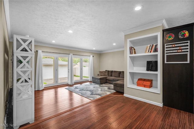 6270 Springwood Rd, Parma Heights, OH 44130 - living room with crown molding, wood finished floors, a textured ceiling, built in features, and recessed lighting