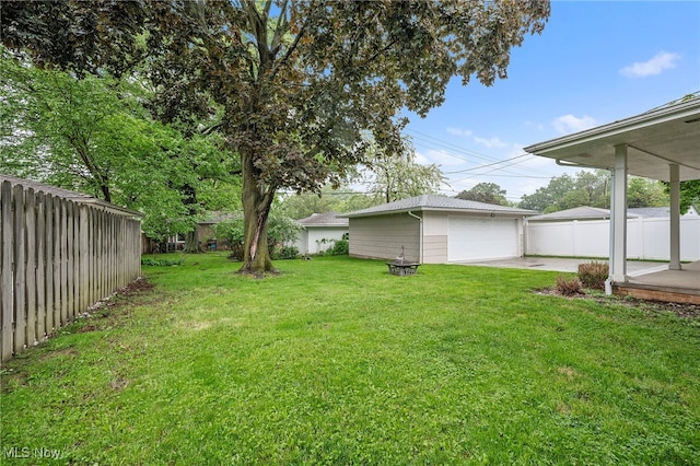 6270 Springwood Rd, Parma Heights, OH 44130 - view of yard with a garage and an outdoor structure