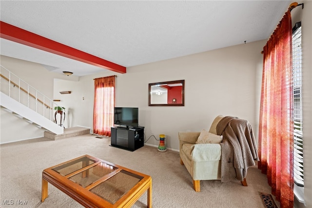 6874 Stratford Cir Unit D, Mentor, OH 44060 - carpeted living area featuring stairway, baseboards, and beamed ceiling