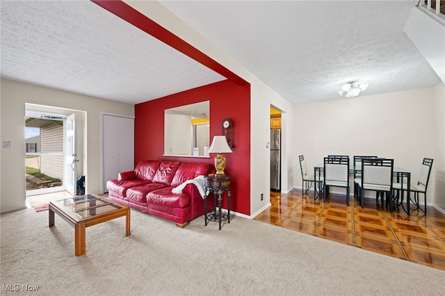 6874 Stratford Cir Unit D, Mentor, OH 44060 - carpeted living area featuring a textured ceiling and baseboards