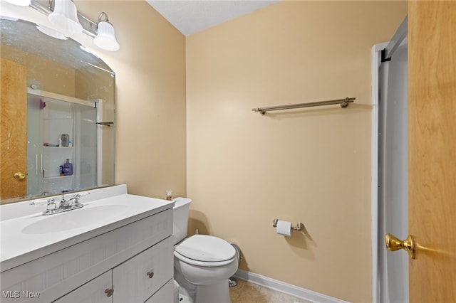 6874 Stratford Cir Unit D, Mentor, OH 44060 - full bathroom with toilet, vanity, an enclosed shower, tile patterned flooring, and baseboards