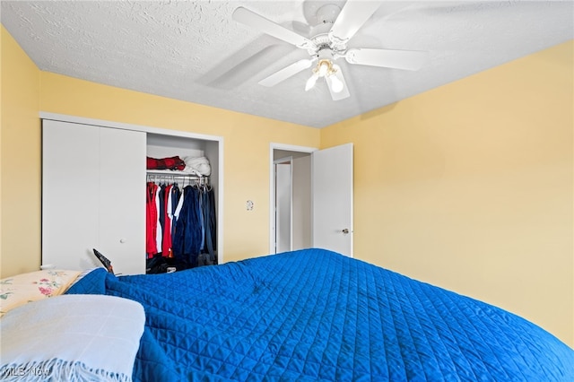 6874 Stratford Cir Unit D, Mentor, OH 44060 - bedroom with a closet, a ceiling fan, and a textured ceiling