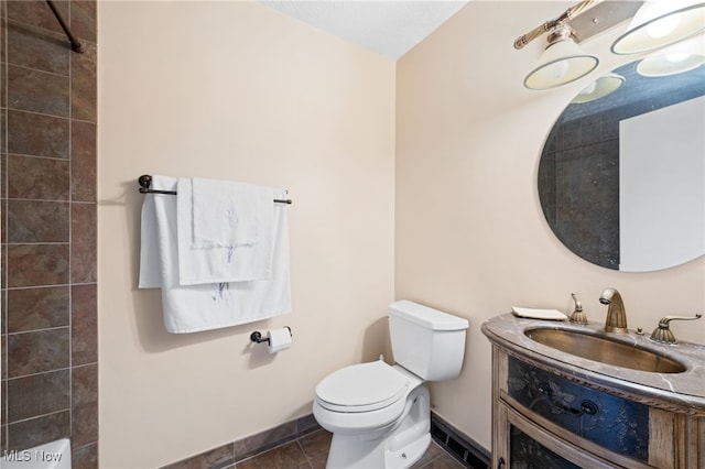 6874 Stratford Cir Unit D, Mentor, OH 44060 - full bathroom featuring toilet, vanity, baseboards, and a shower