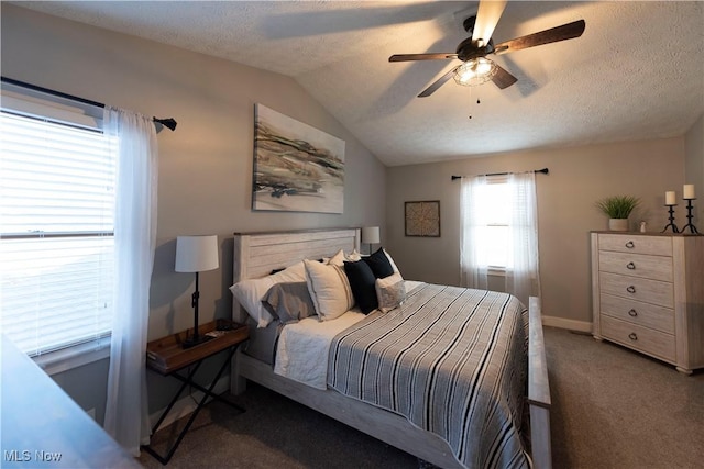 10957 Mogadore Ave NW, Uniontown, OH 44685 - carpeted bedroom featuring vaulted ceiling, a textured ceiling, and ceiling fan