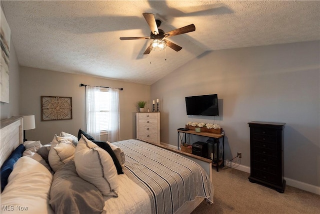 10957 Mogadore Ave NW, Uniontown, OH 44685 - bedroom with light colored carpet, a textured ceiling, a ceiling fan, and baseboards