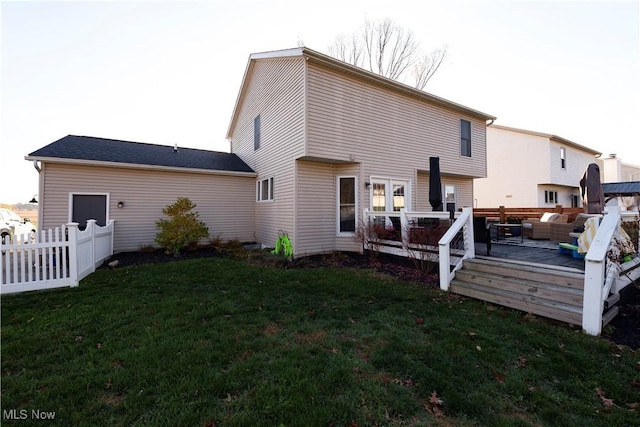 10957 Mogadore Ave NW, Uniontown, OH 44685 - rear view of house featuring an outdoor living space and a deck