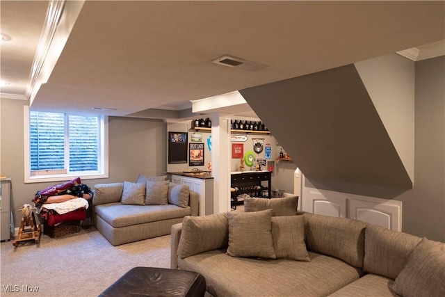 10957 Mogadore Ave NW, Uniontown, OH 44685 - carpeted living room with ornamental molding and bar
