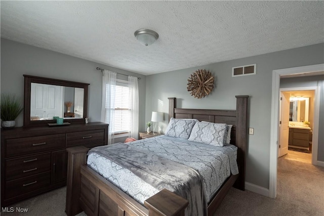 10957 Mogadore Ave NW, Uniontown, OH 44685 - bedroom with carpet flooring, a textured ceiling, and baseboards