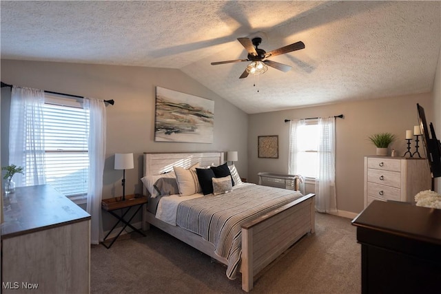10957 Mogadore Ave NW, Uniontown, OH 44685 - bedroom with a textured ceiling, lofted ceiling, carpet flooring, ceiling fan, and baseboards