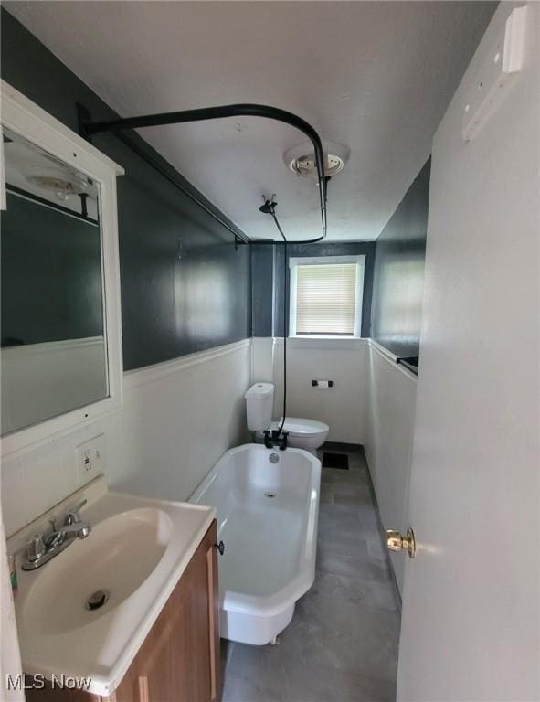 237 W Union St, Medina, OH 44256 - bathroom with toilet, vanity, a tub, and a bidet