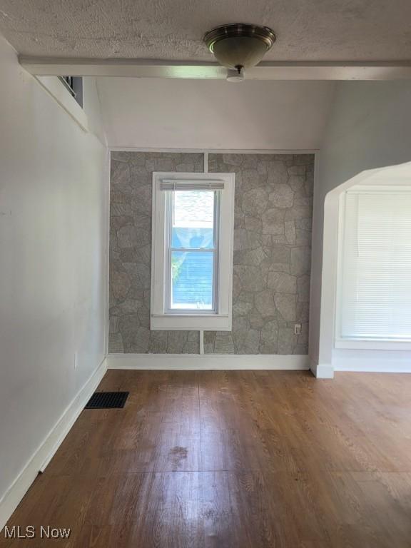 237 W Union St, Medina, OH 44256 - spare room with wood finished floors, baseboards, and a textured ceiling