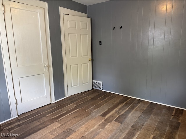 324 The Brooklands, Akron, OH 44305 - unfurnished bedroom with dark wood-style floors