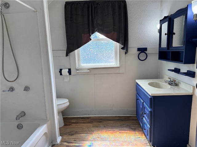 324 The Brooklands, Akron, OH 44305 - full bath with wood finished floors, vanity, toilet, bathing tub / shower combination, and baseboards