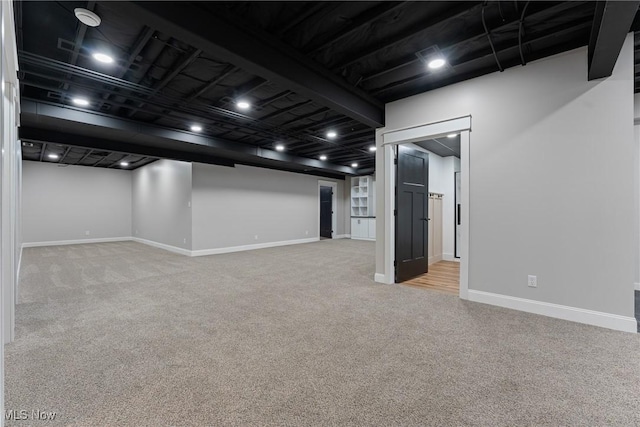 1820 Schneider St NW, North Canton, OH 44720 - finished below grade area featuring carpet flooring and baseboards