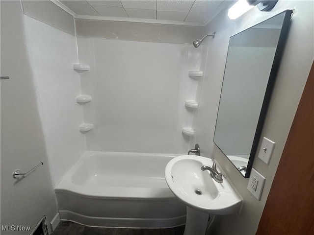 1706 Adams St, Coshocton, OH 43812 - full bath featuring shower / bath combination, ornamental molding, and a sink