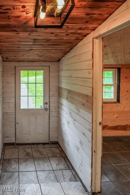 29655 Buck Rd, Salem, OH 44460 - entryway with wooden ceiling, lofted ceiling, wooden walls, and tile patterned flooring