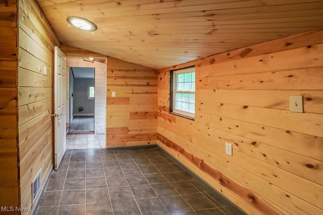 29655 Buck Rd, Salem, OH 44460 - spare room with lofted ceiling, wood walls, wooden ceiling, and dark tile patterned floors