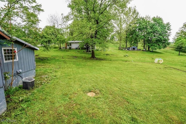 29655 Buck Rd, Salem, OH 44460 - view of green lawn with central AC